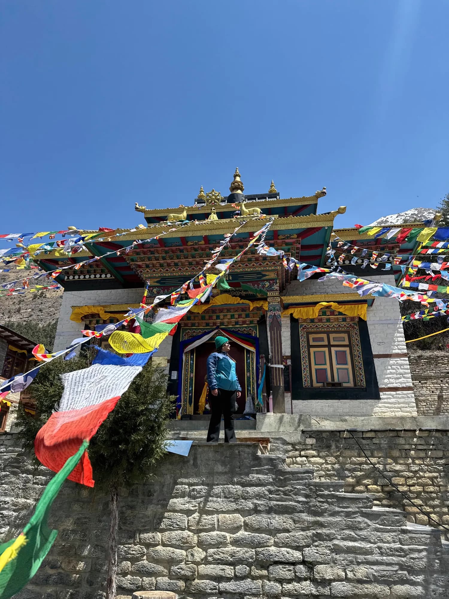 Prayer flags across the painted entrance to Braga monastery