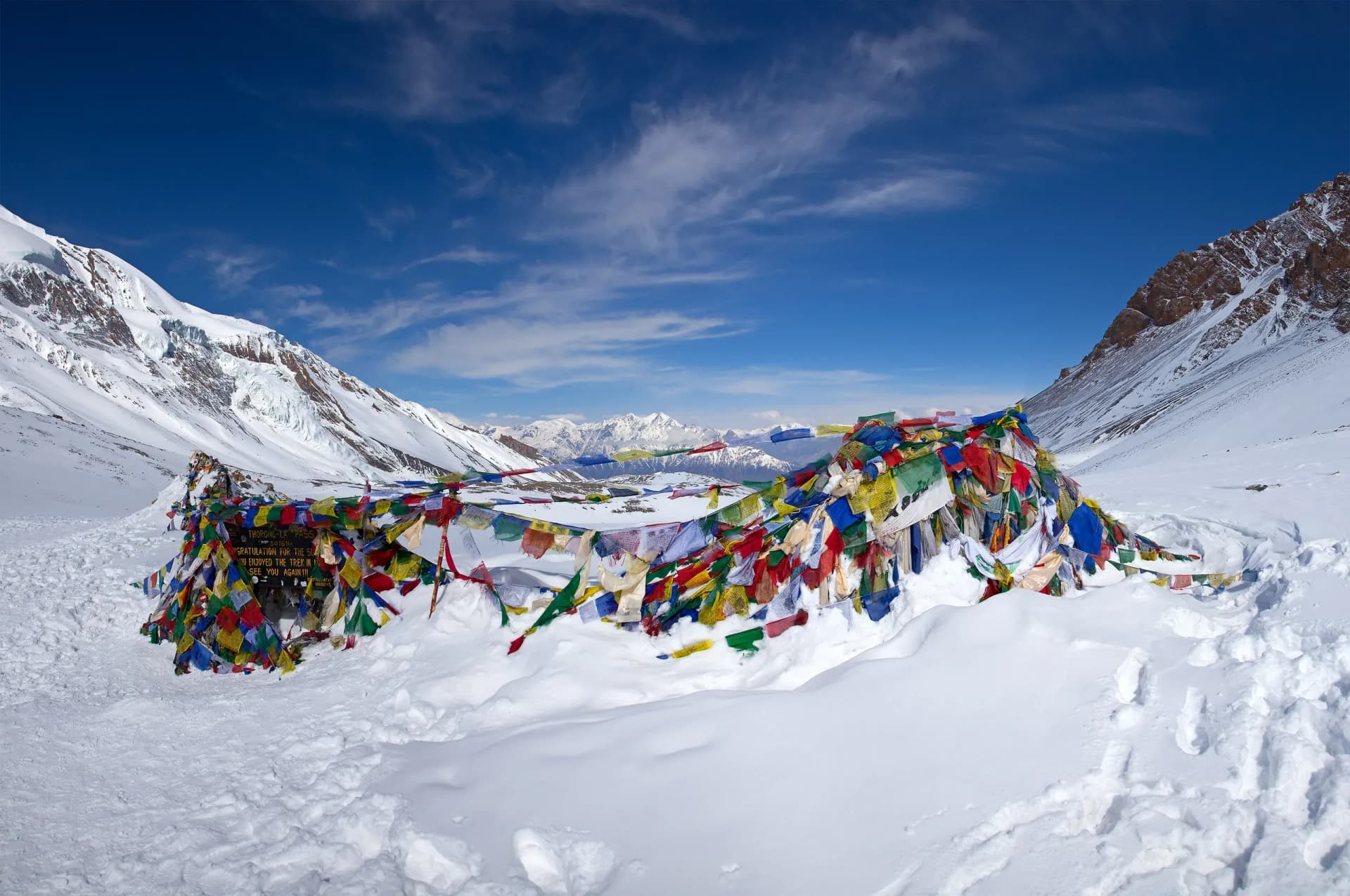 Thorong La pass april 2011 near Thorong La sign / prayer flags or Muktinath temple on the Annapurna Circuit trek in Nepal