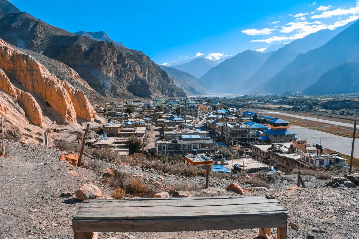 Jomsom town and the Kali Gandaki riverbed beneath the dry mountains of Mustang.