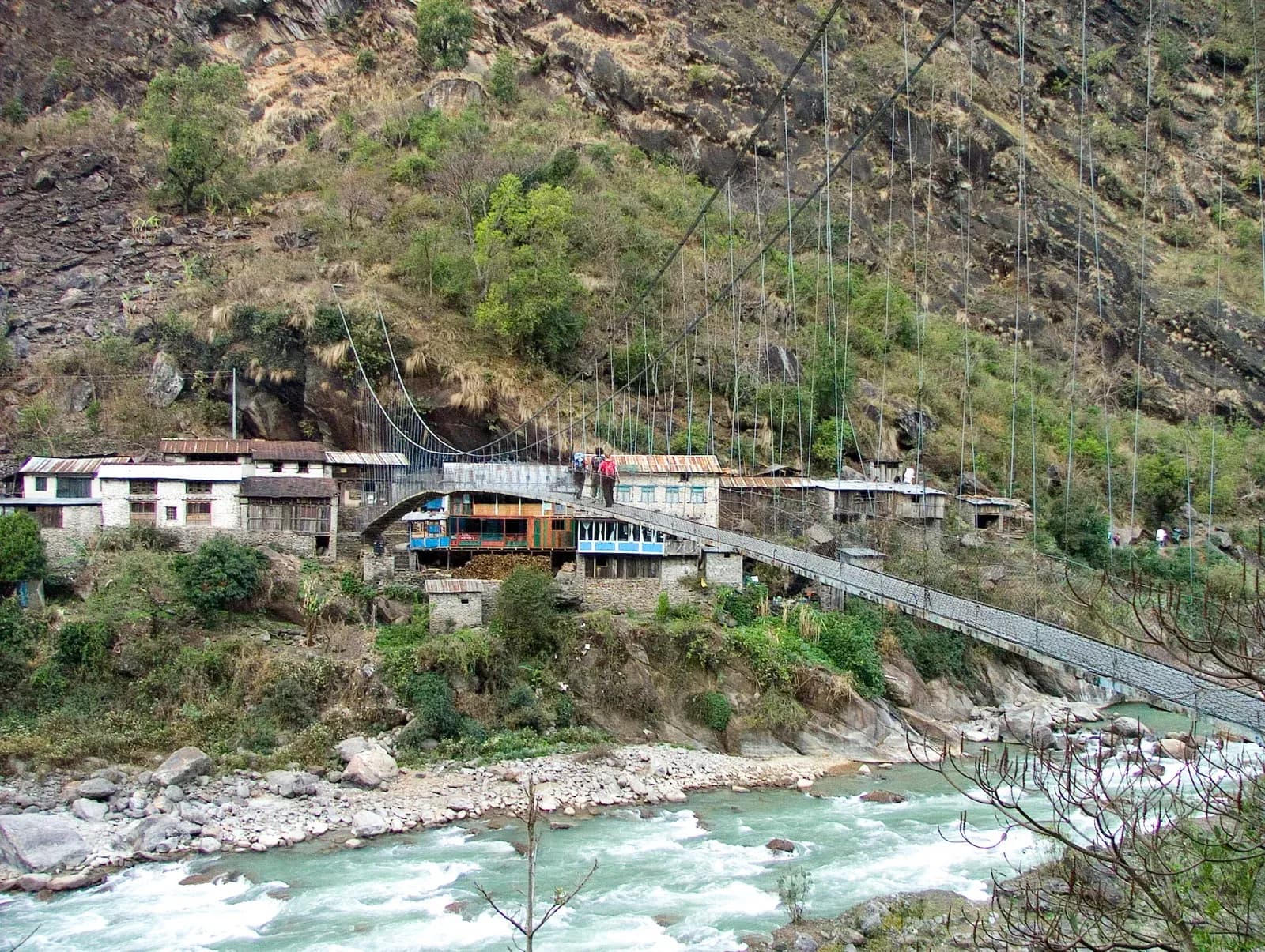 Bridge crossing, Annapurna national park, Nepal near Kathmandu to Chyamje, Marsyangdi gorge on the Tilicho Lake trek in Nepal